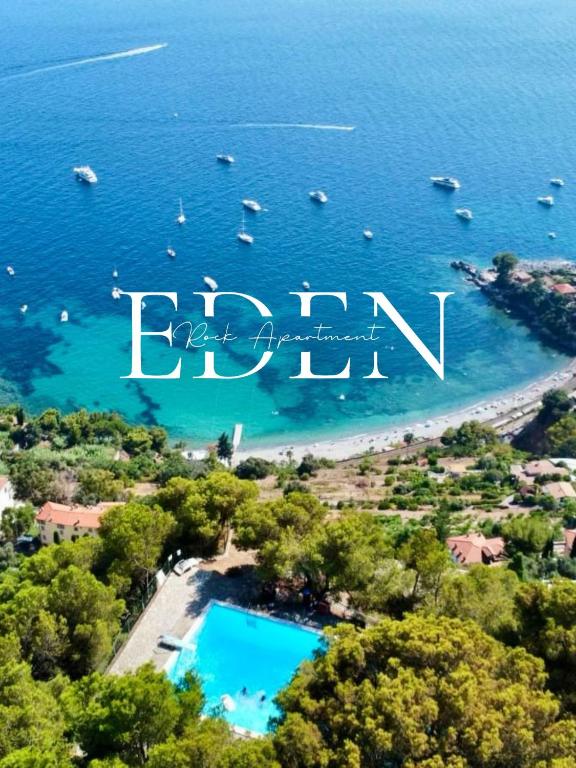 an aerial view of an island with boats in the water at Eden rock apartment in Grimaldi