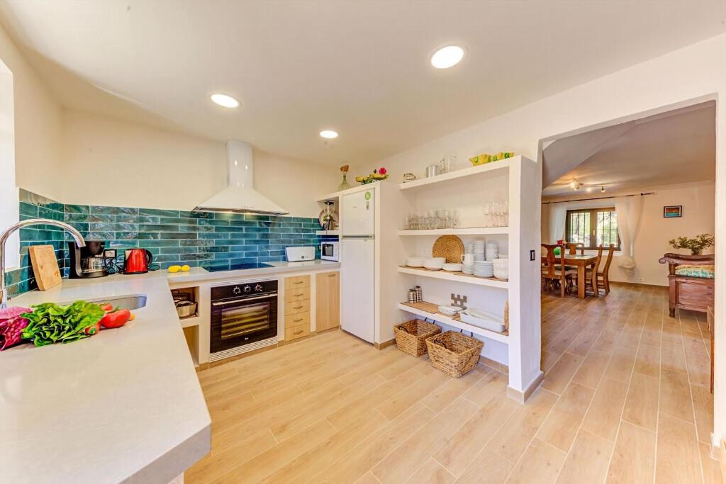 A kitchen or kitchenette at Tranquil Pollensa Villa Finca Plana Den Rull Set In The Beautiful Ternelles Valley Private Pool
