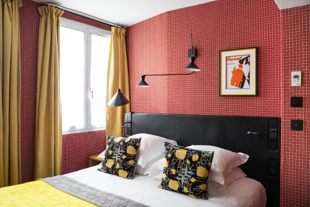 Postel nebo postele na pokoji v ubytování Hôtel Artus