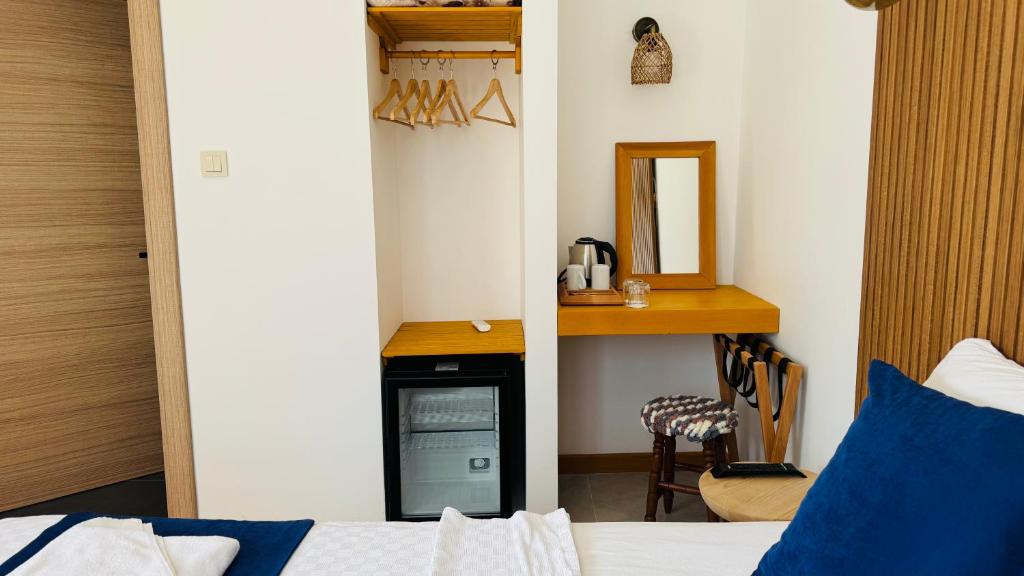 A bed or beds in a room at Tomsan Suites & Villas Akyaka
