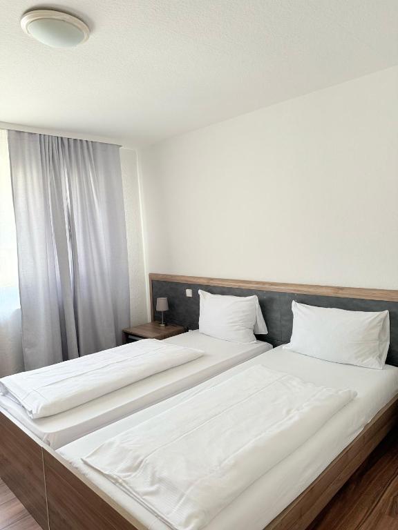 Postel nebo postele na pokoji v ubytování Hotel Altavilla