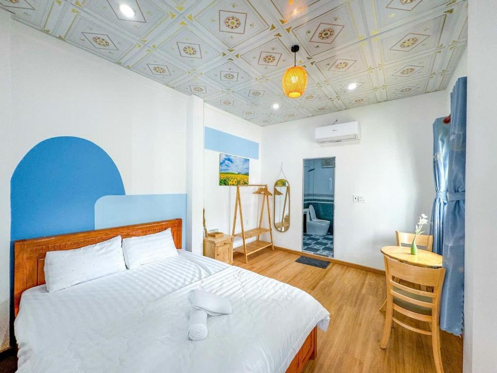 Ένα ή περισσότερα κρεβάτια σε δωμάτιο στο Homestay Phúc Lộc