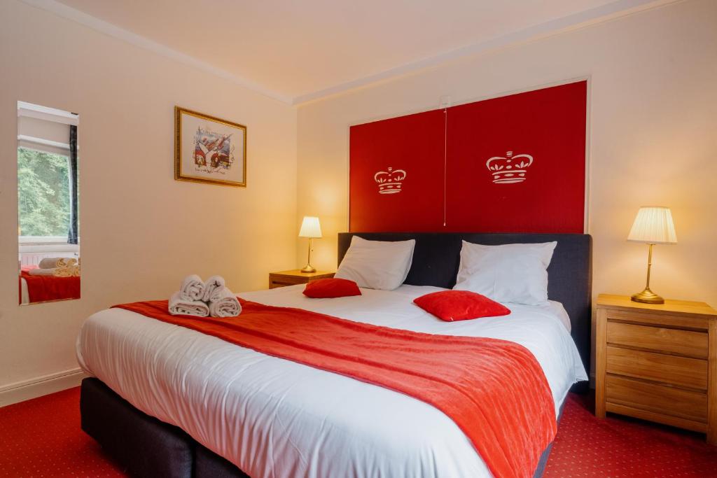Postel nebo postele na pokoji v ubytování Hotel L'eau Vive
