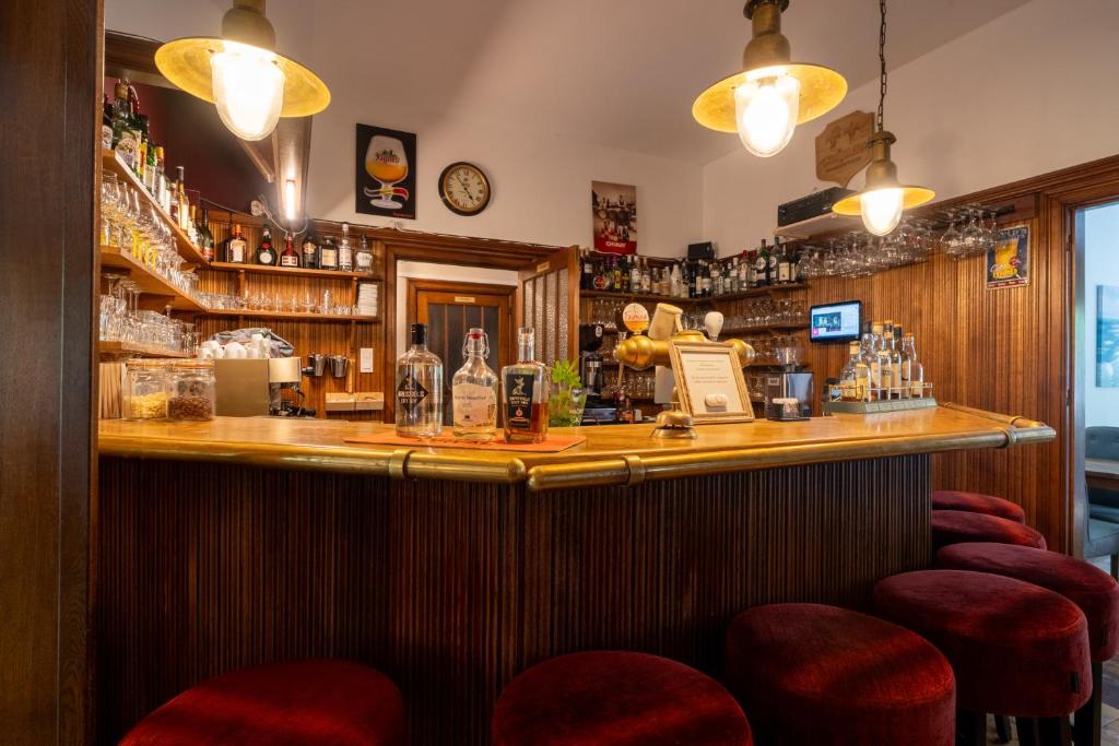Lounge nebo bar v ubytování Hotel L'eau Vive