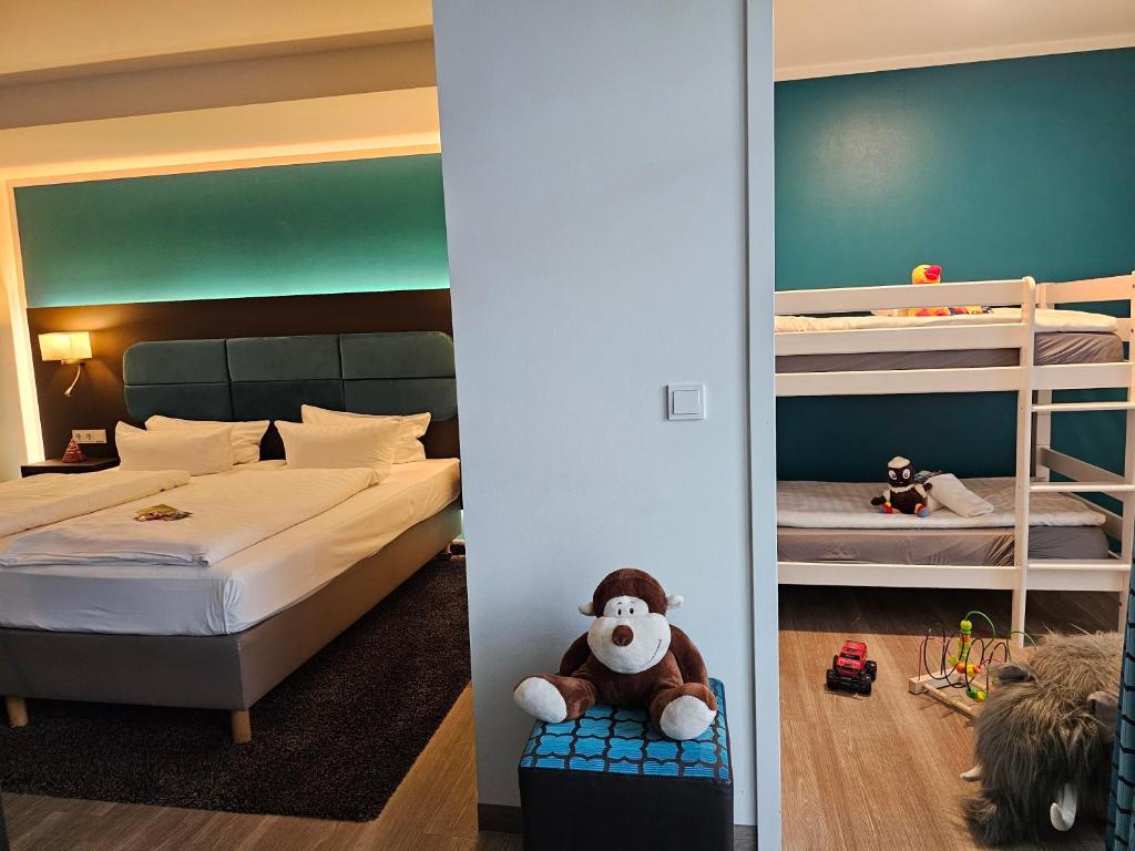 Voodi või voodid majutusasutuse Hotel Am Kaisersaal toas