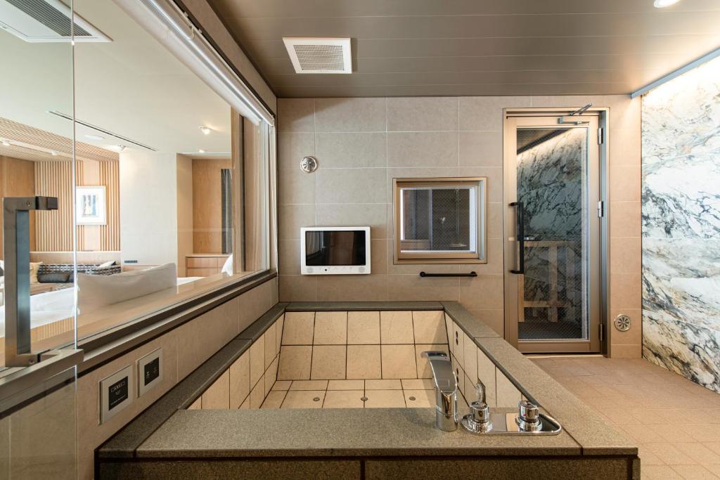 Kuchyň nebo kuchyňský kout v ubytování TERRACE HOTEL f 新大阪