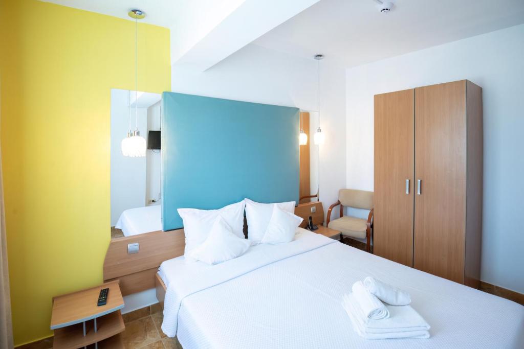 Postel nebo postele na pokoji v ubytování Complex Modern All Inclusive Mamaia