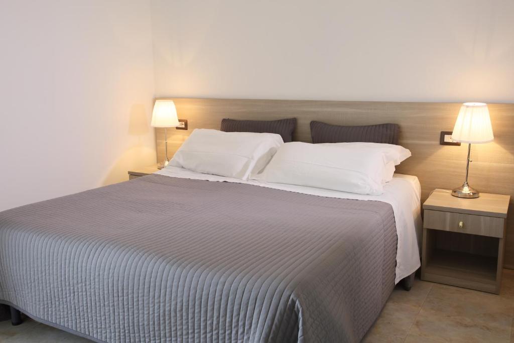 Cama o camas de una habitación en Villa Astoria