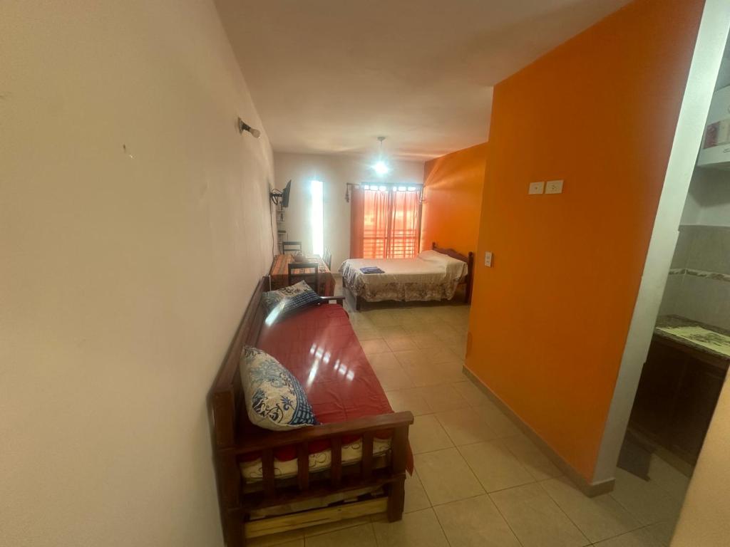 Giường trong phòng chung tại Alquiler de departamento temporario