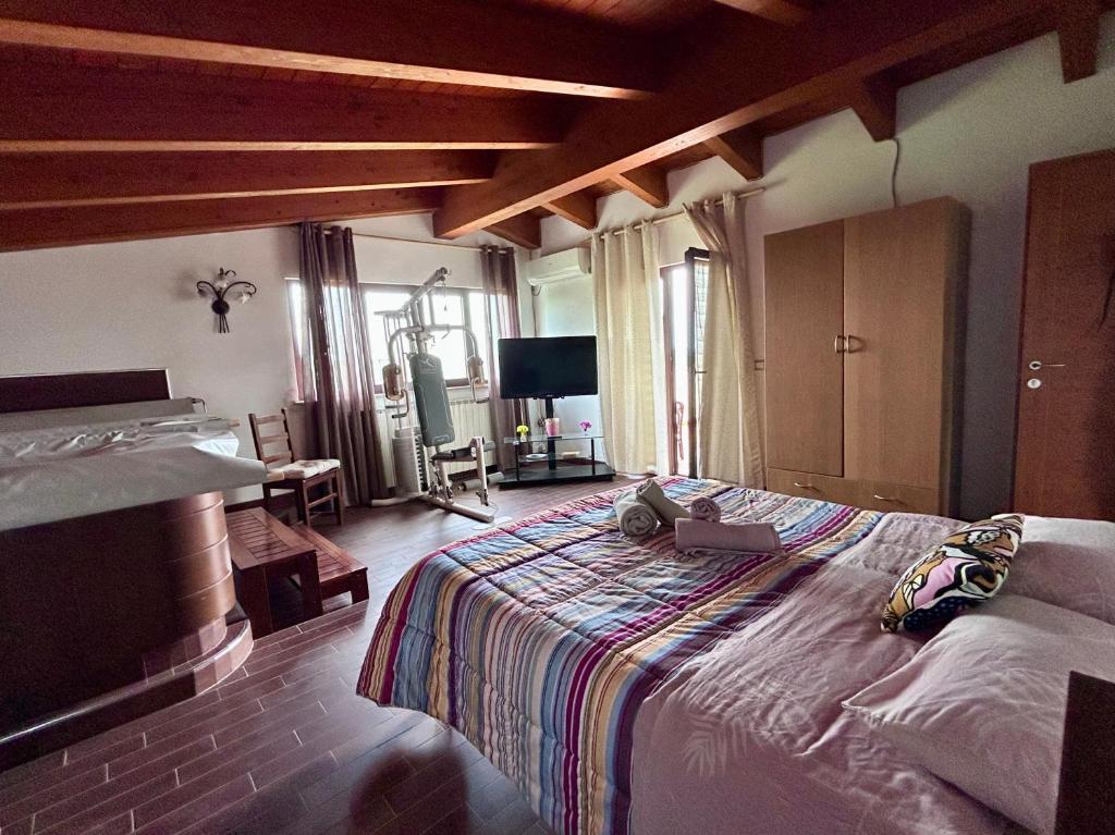 Posteľ alebo postele v izbe v ubytovaní LA VILLA IN CAMPAGNA