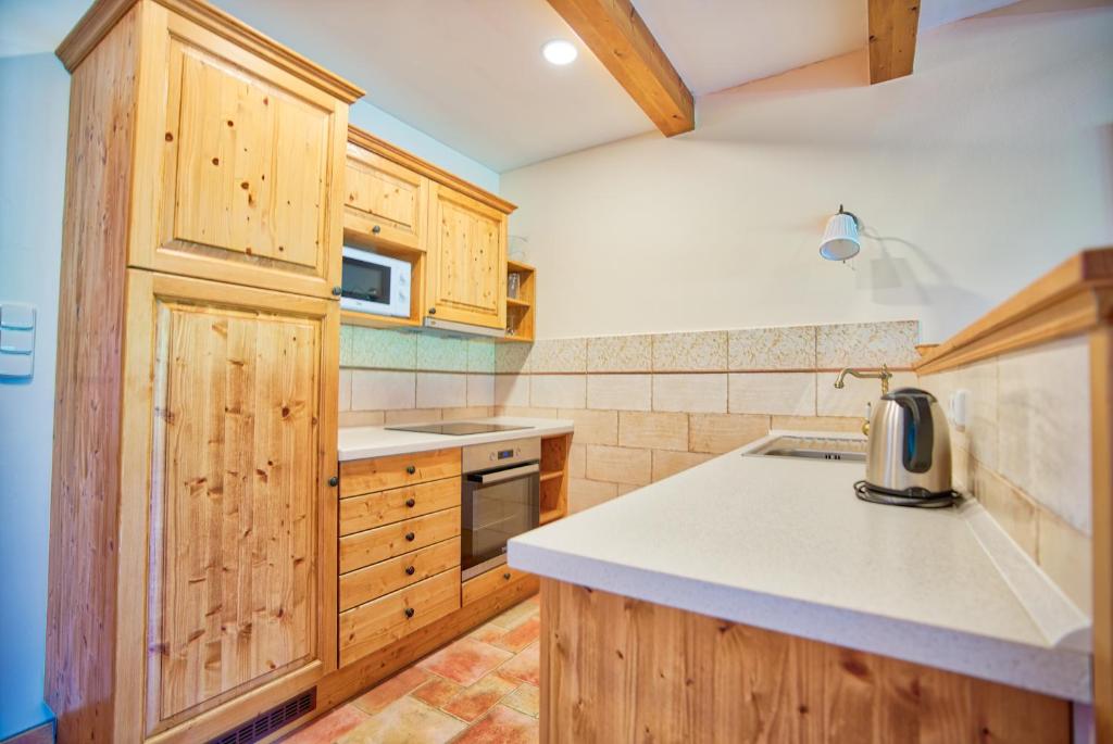 Kuchyň nebo kuchyňský kout v ubytování Apartmány nad stájemi - Jítravský Dvorec
