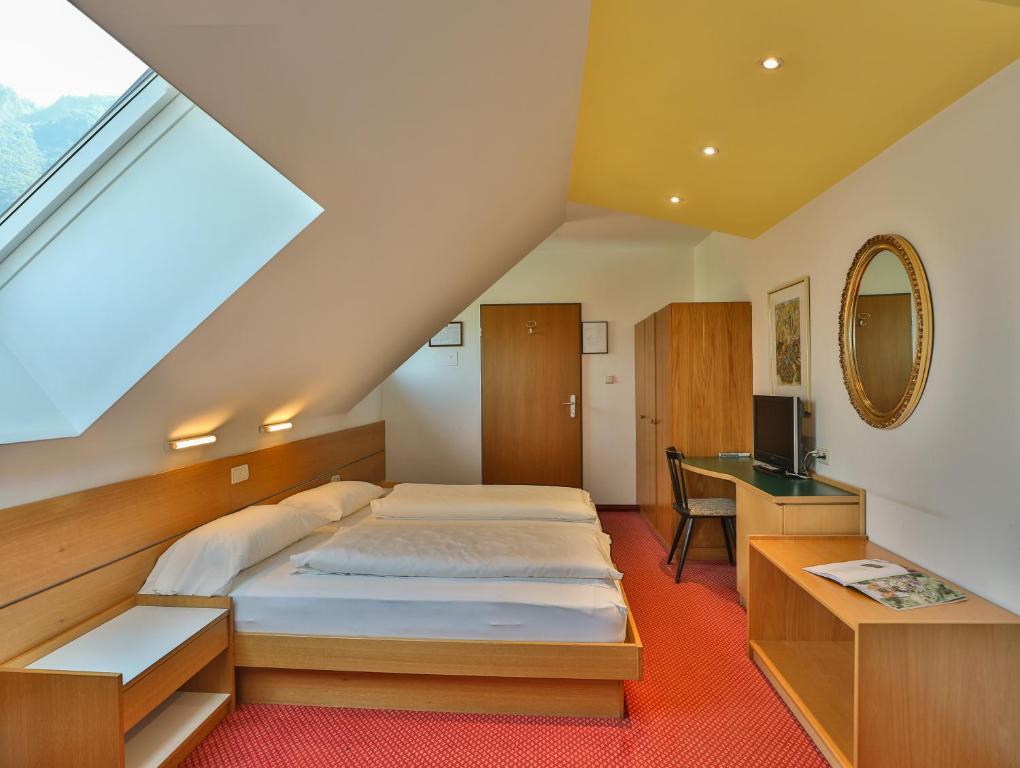 Postel nebo postele na pokoji v ubytování Hotel Sparerhof