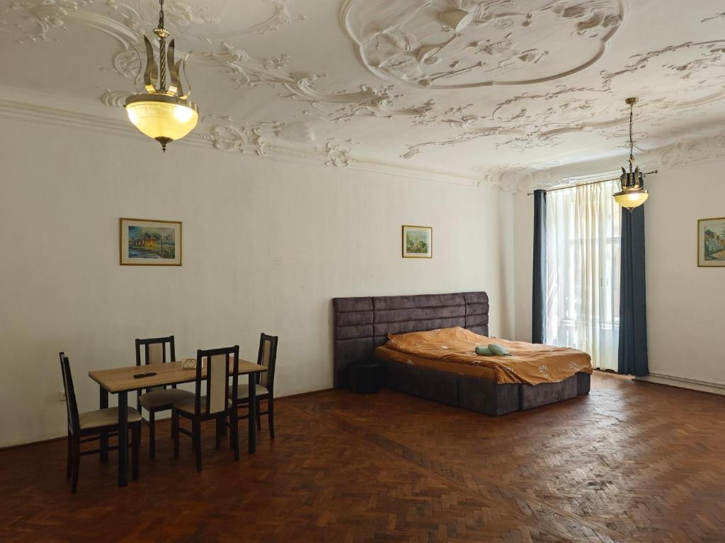 En eller flere senge i et værelse på Clasic Studio Central