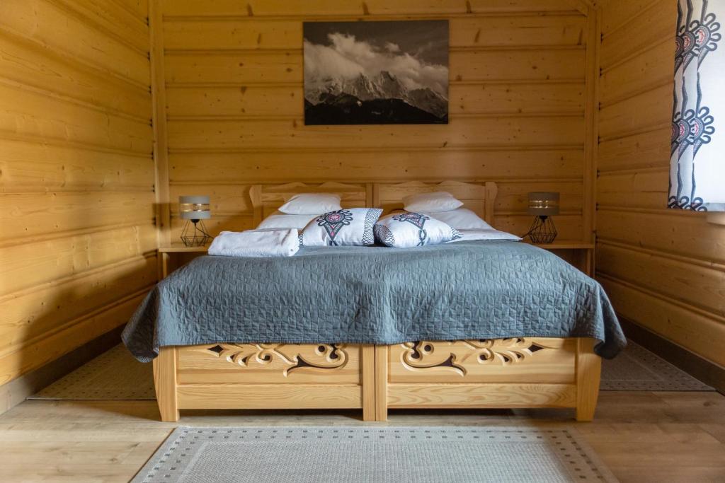 Postel nebo postele na pokoji v ubytování Domek W zasięgu Tatr