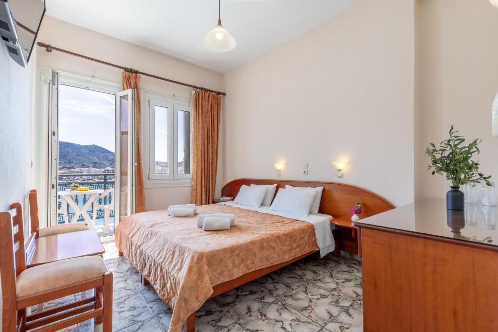 Postel nebo postele na pokoji v ubytování Lemonis Rooms