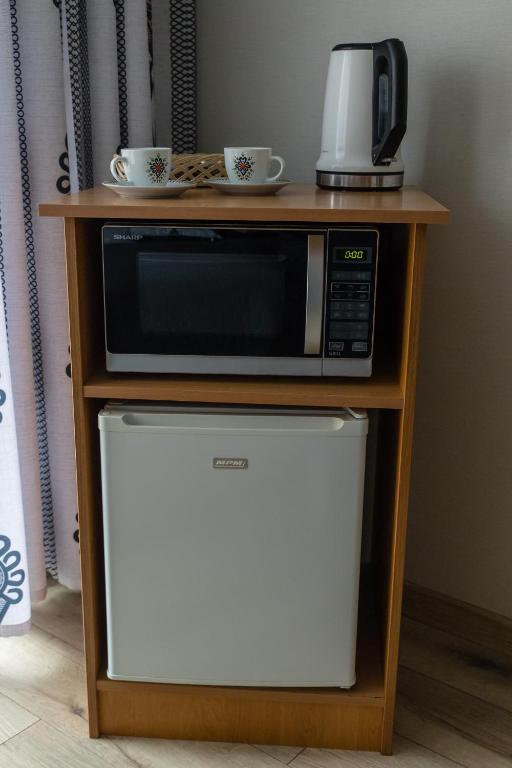 Kuchyň nebo kuchyňský kout v ubytování Pokoje Gościnne " W zasięgu Tatr"