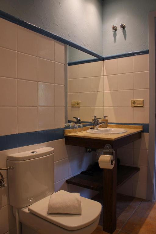Koupelna v ubytování Hotel Al Riu