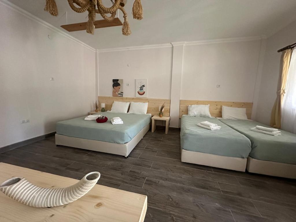 Postel nebo postele na pokoji v ubytování Mavi Lotus Pansiyon