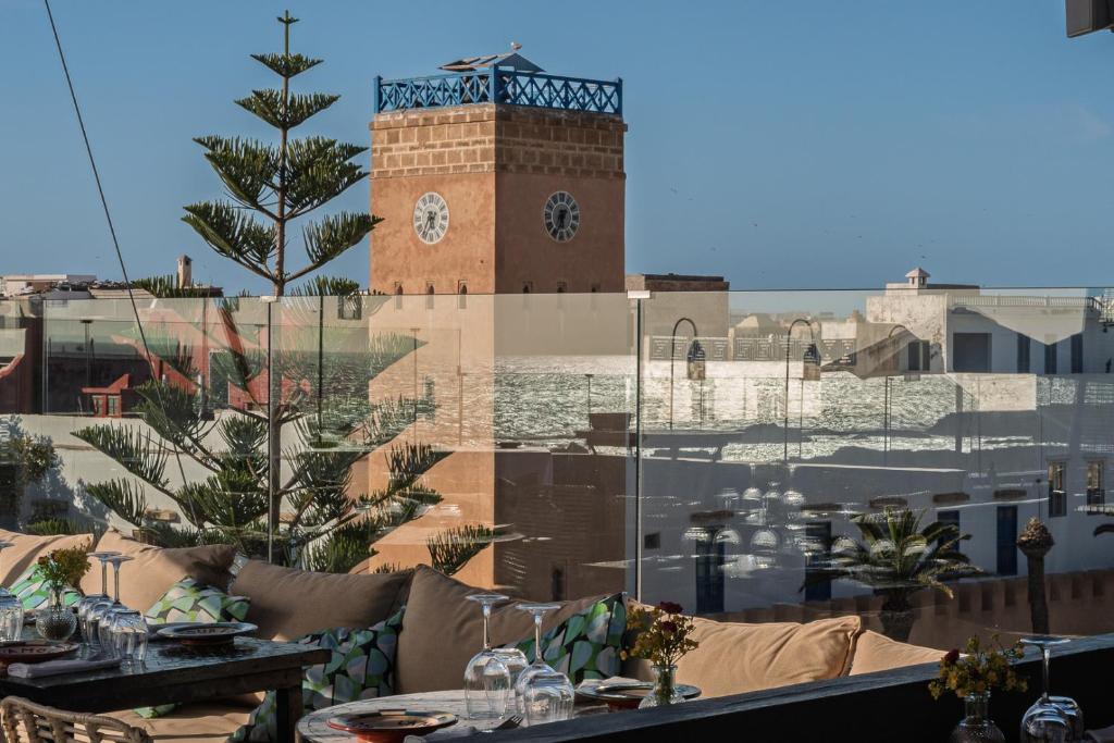 a view of a building with a clock tower at Le Palazzo in Essaouira