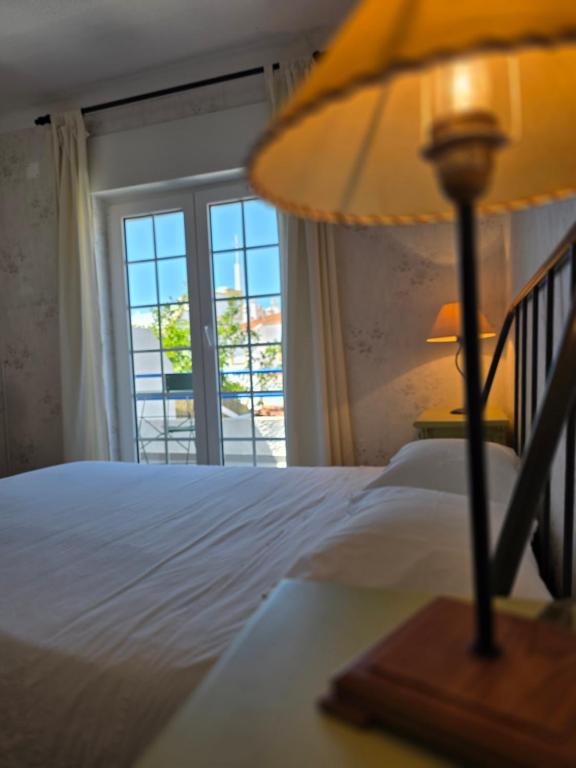 Postel nebo postele na pokoji v ubytování Soleil Bleu