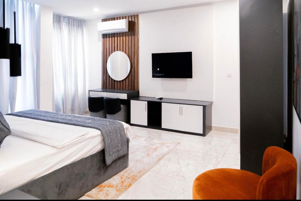 TV a/nebo společenská místnost v ubytování Vertus Hotel and Suites