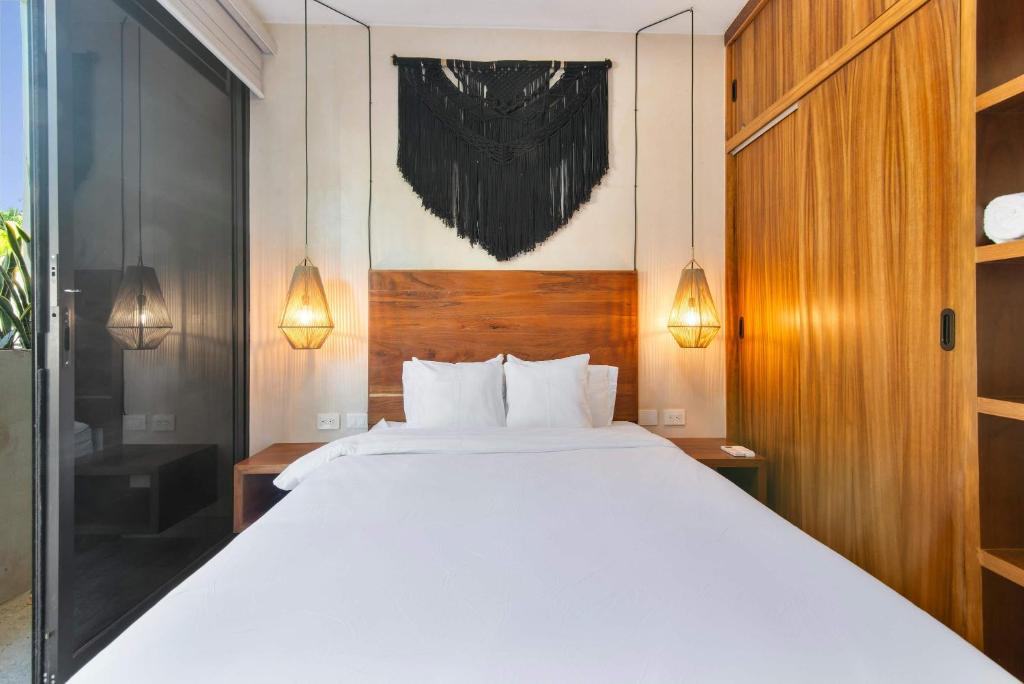 Letto o letti in una camera di 2-BR Aldea Zama Sanctuary of Tulum