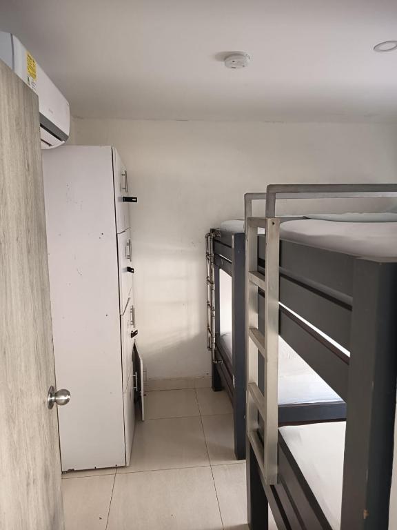 Postel nebo postele na pokoji v ubytování SAN JACINTO HOSTEL