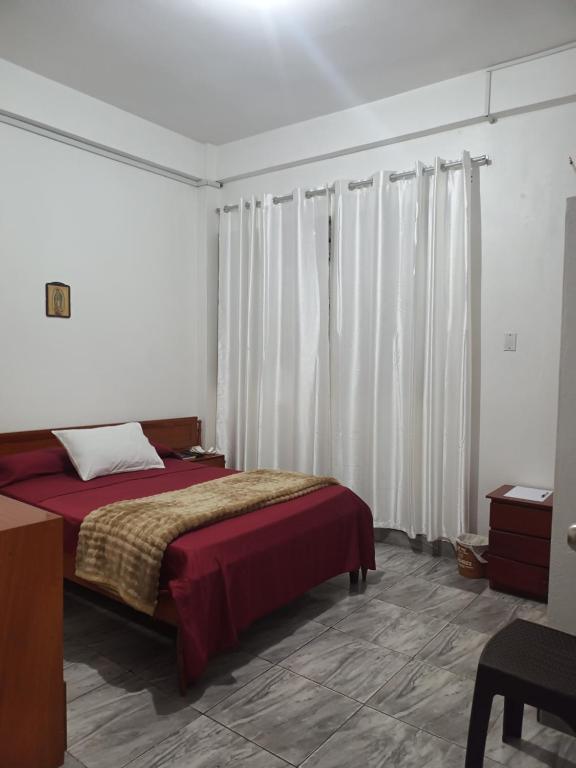 Кровать или кровати в номере Casa Gaston