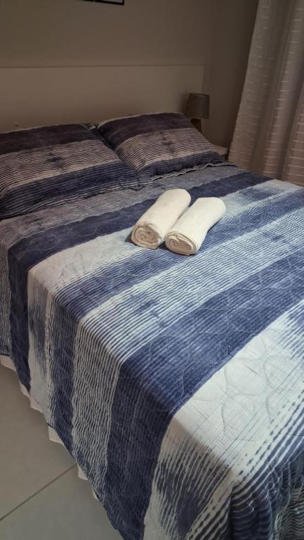 En eller flere senge i et værelse på Praia Ilha de Itamaracá