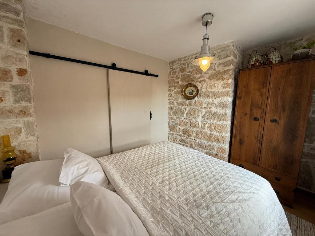 Postel nebo postele na pokoji v ubytování Villa di Piazza