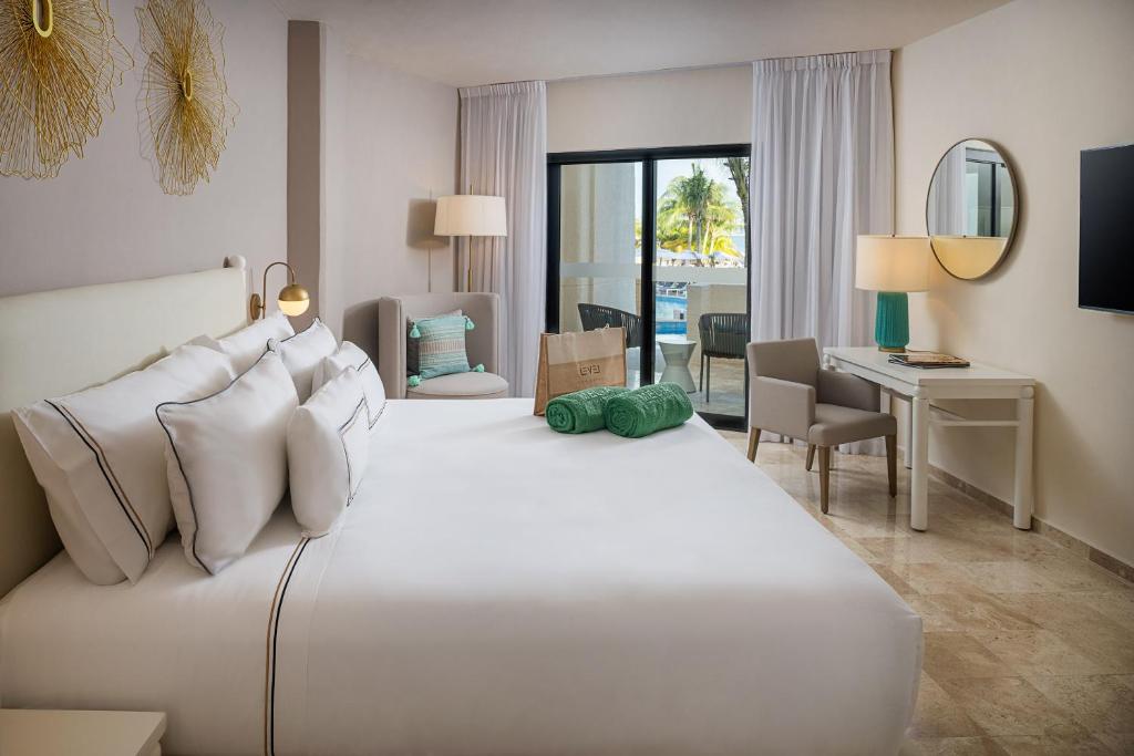 Postel nebo postele na pokoji v ubytování Melia Casa Maya Cancun All Inclusive