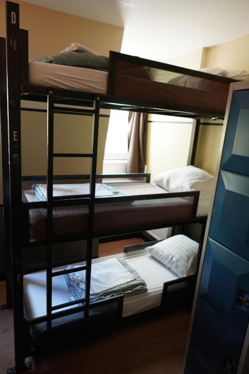 Postel nebo postele na pokoji v ubytování Onefam Amstel