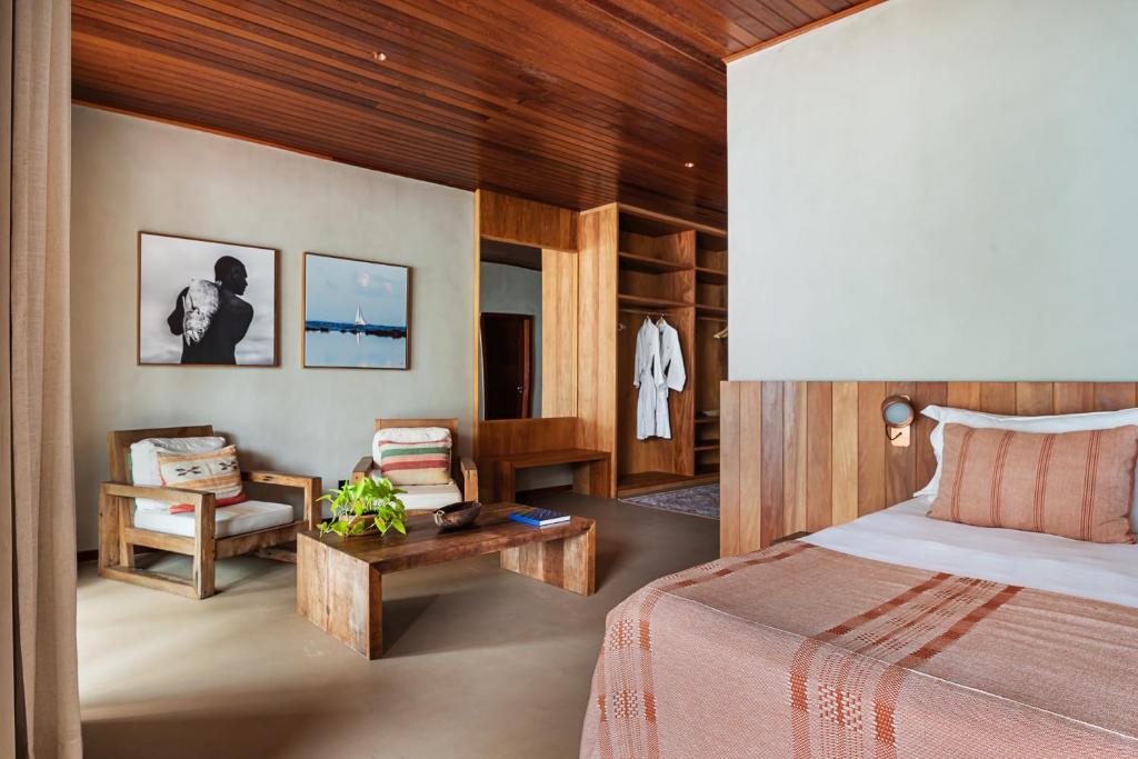 Cama ou camas em um quarto em Barracuda Boutique