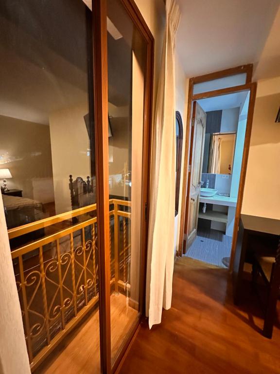 Postel nebo postele na pokoji v ubytování Hotel Las Quenas