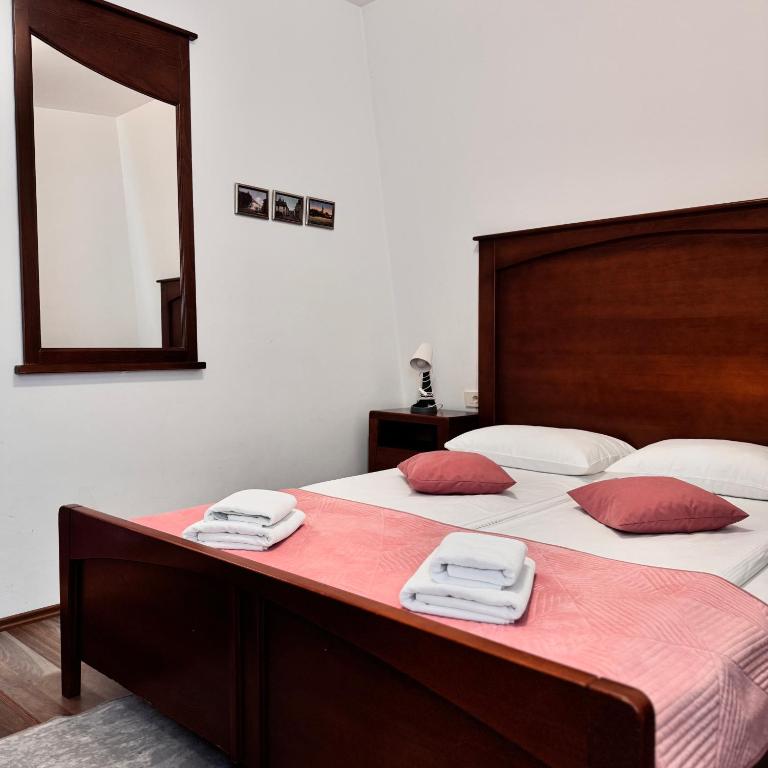 Postel nebo postele na pokoji v ubytování Hotel Paviljon