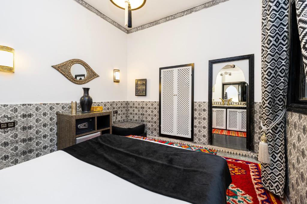 Postel nebo postele na pokoji v ubytování Riad Luzia