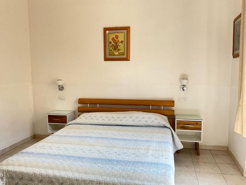 Posteľ alebo postele v izbe v ubytovaní Affittacamere Vanessa
