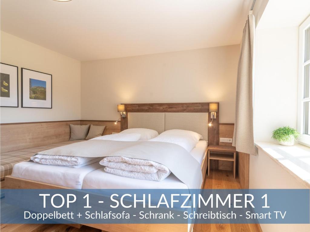 Posteľ alebo postele v izbe v ubytovaní Heimathaus Dengg - Ferienwohnungen - Sommerfrische in den Alpen
