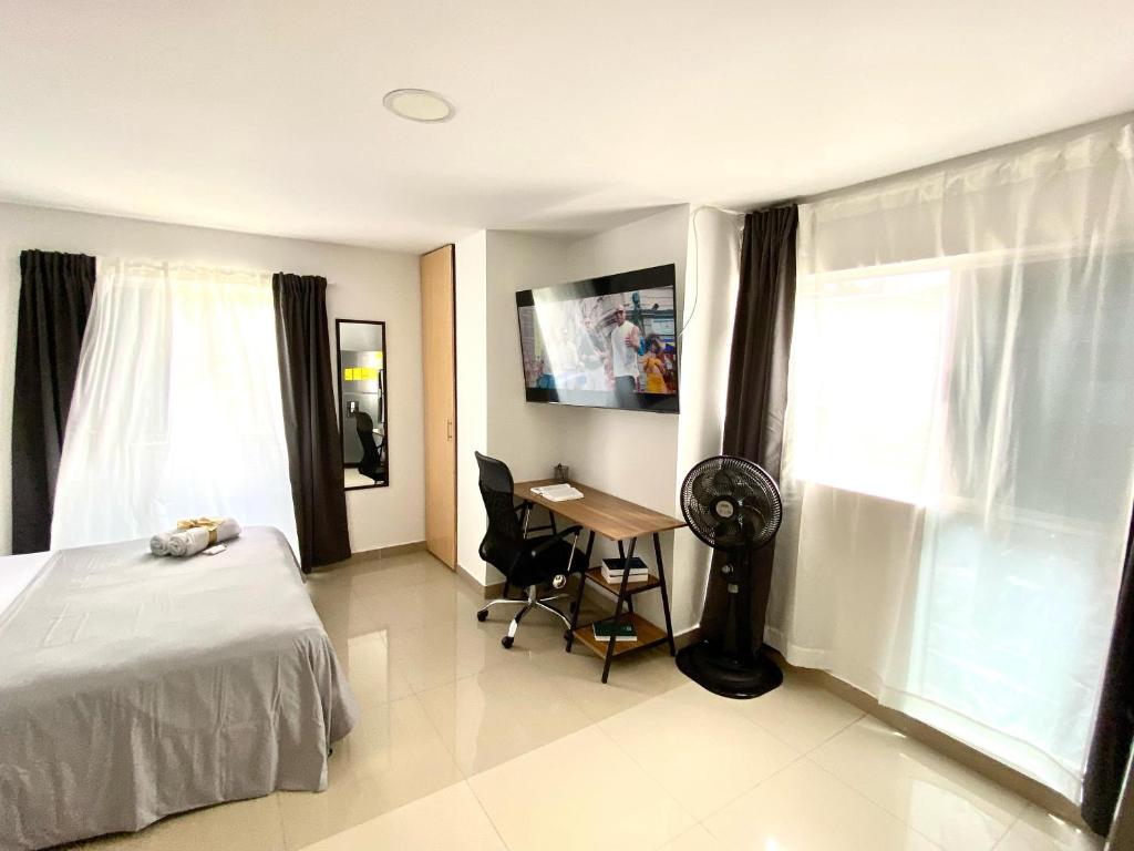 Postel nebo postele na pokoji v ubytování Central living - apartaestudio confortable