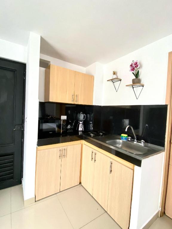 Kuchyň nebo kuchyňský kout v ubytování Central living - apartaestudio confortable