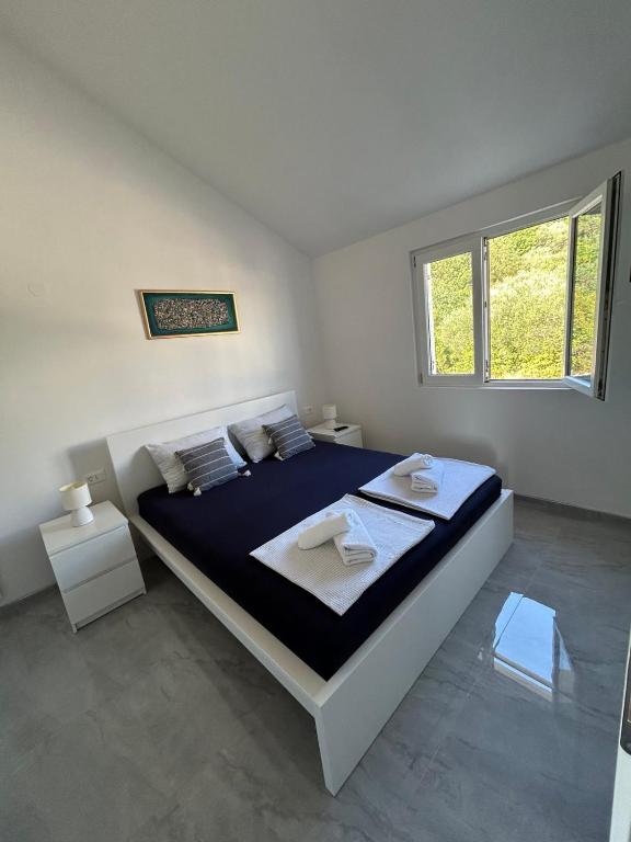 Postel nebo postele na pokoji v ubytování Apartment Olyntha
