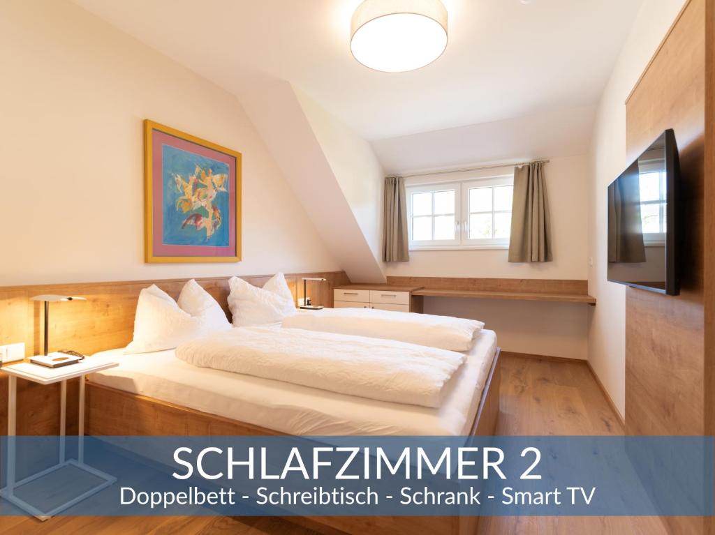Televízia a/alebo spoločenská miestnosť v ubytovaní Heimathaus Dengg - Ferienwohnungen - Sommerfrische in den Alpen