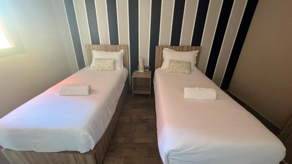 Postel nebo postele na pokoji v ubytování Appartement 3 vue sur mer