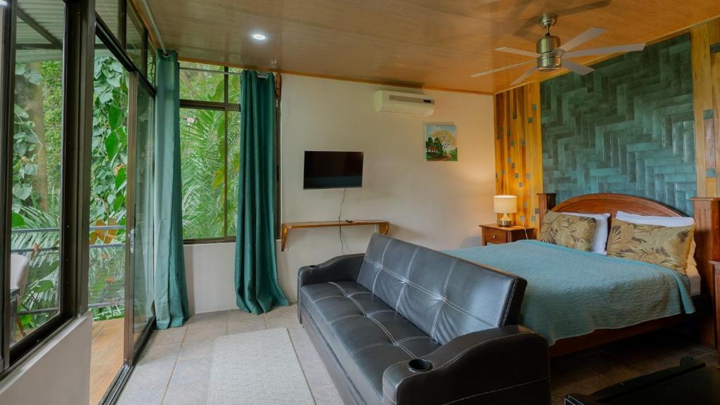 Postel nebo postele na pokoji v ubytování Boutique Hotel Las Cascadas