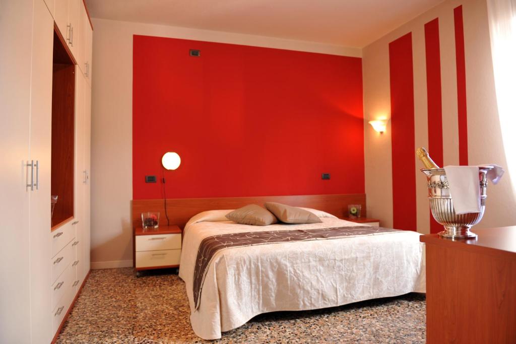 Postel nebo postele na pokoji v ubytování Hotel Bellavista Meublè