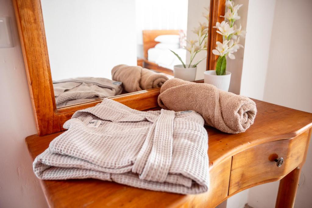 Postel nebo postele na pokoji v ubytování Hotel Miconia