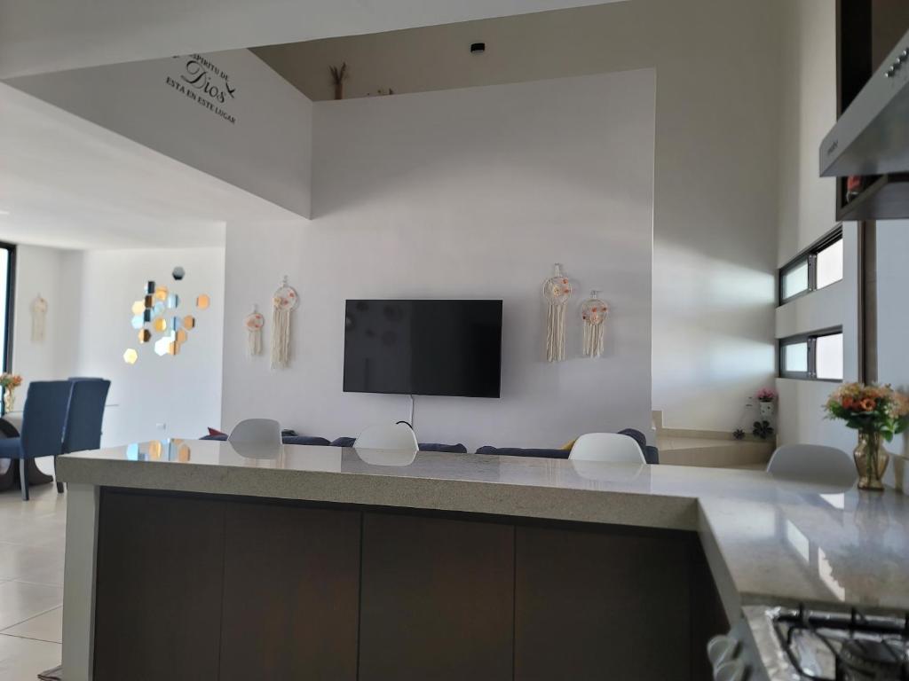 TV a/nebo společenská místnost v ubytování Casa de Dios