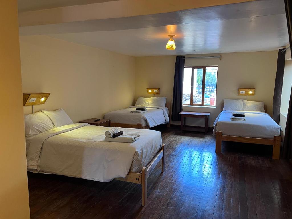 Postel nebo postele na pokoji v ubytování Eco Inn