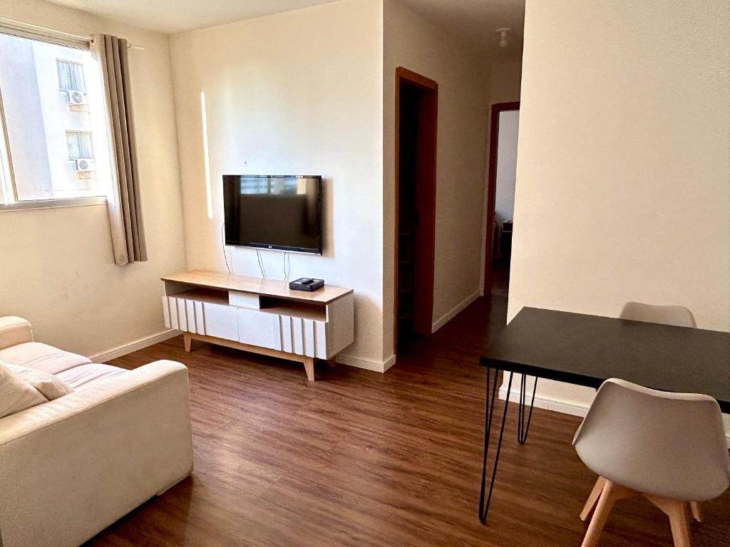 Μια τηλεόραση ή/και κέντρο ψυχαγωγίας στο Apartamento - Gleba Palhano Home X