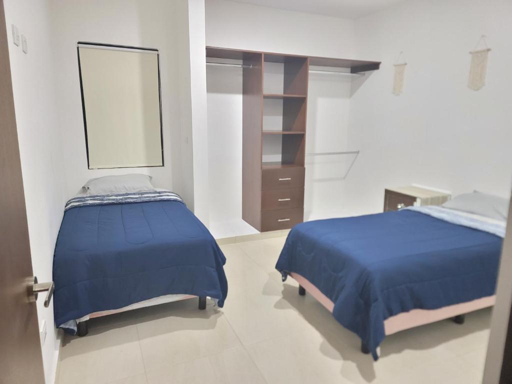 Postel nebo postele na pokoji v ubytování Casa de Dios